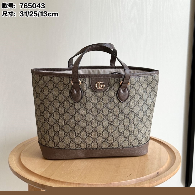 G*u*i shopping bags